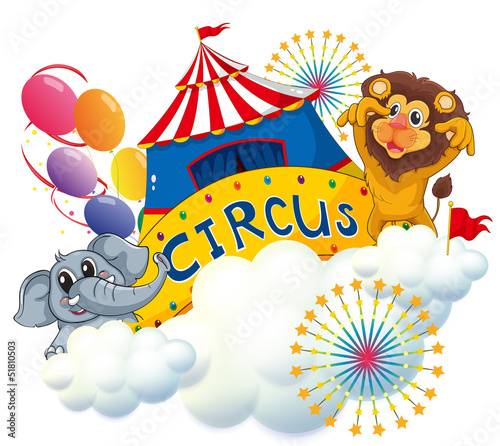 A lion and an elephant near the circus signage