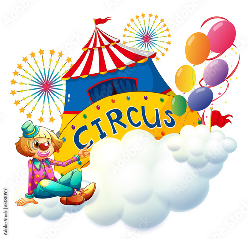 A clown sitting with a circus signboard