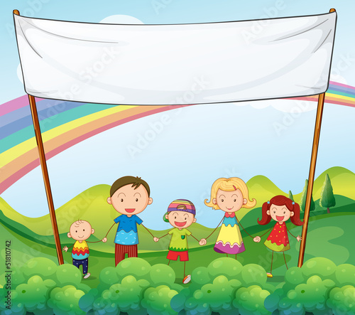 A family in the garden with an empty banner
