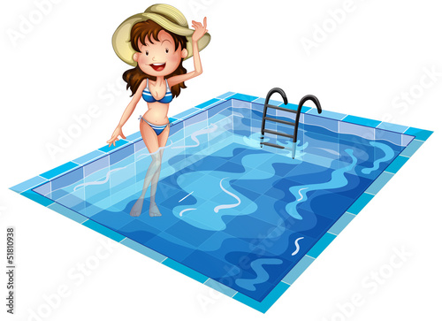 A girl wearing a swimsuit at the pool