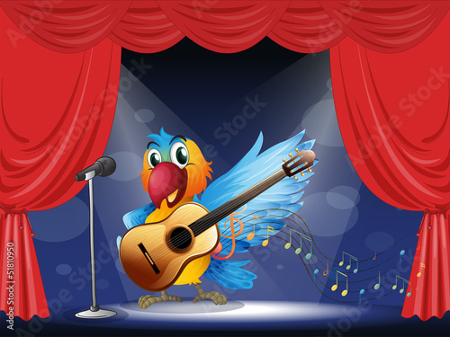 A bird performing above the stage