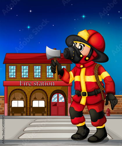 A fireman holding an ax outside the fire station