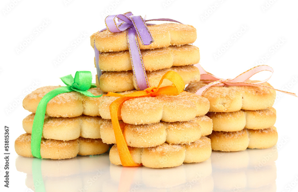 Sweet cookies tied with colorful ribbons isolated on white Sweet cookies tied with colorful ribbons isolated on white