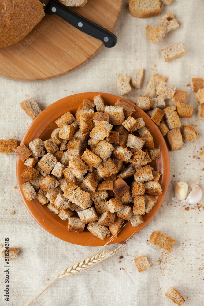 Fototapeta premium rusks of white bread, top view