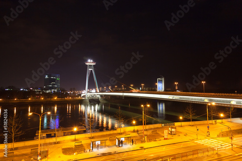 Night traffic on the bridge across the Dunai