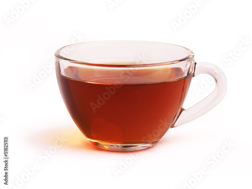 Glass cup of black tea