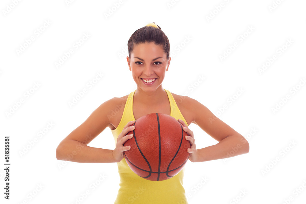 woman holding a basketball ball woman holding a basketball ball
