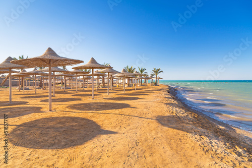 Egyptian parasols on the beach of Red Sea