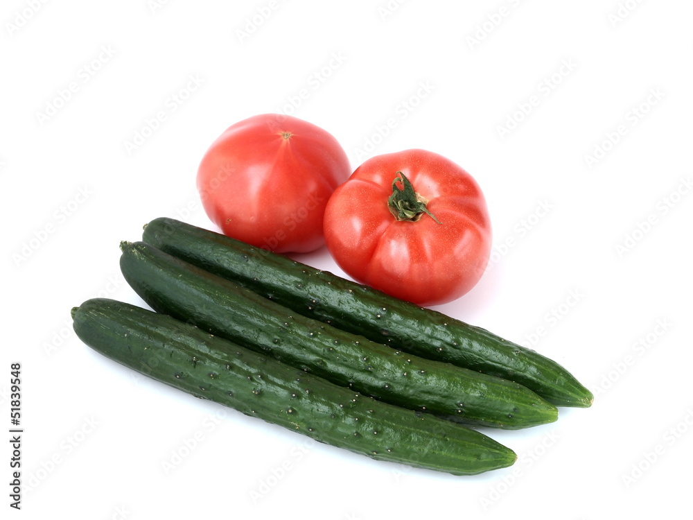 Tomato and cucumber isolated on white background
