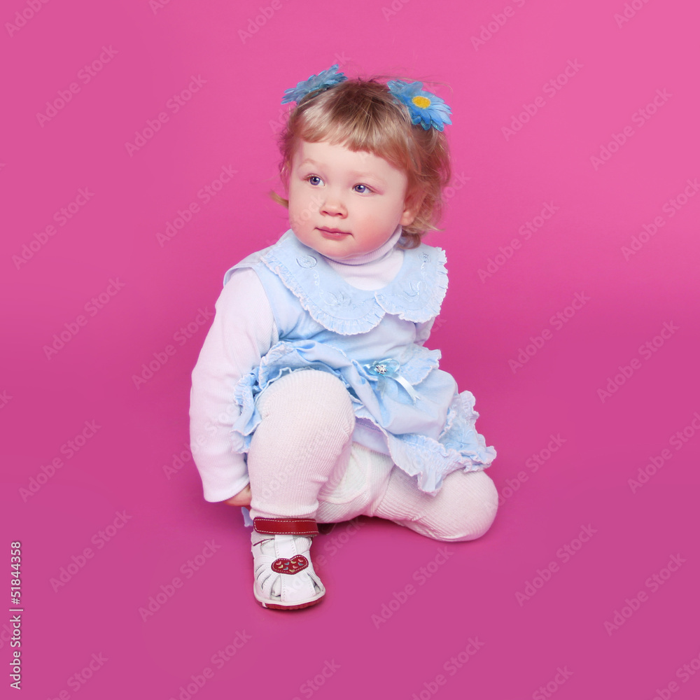 Portrait of funny cute little girl over pink background Portrait of funny cute little girl over pink background