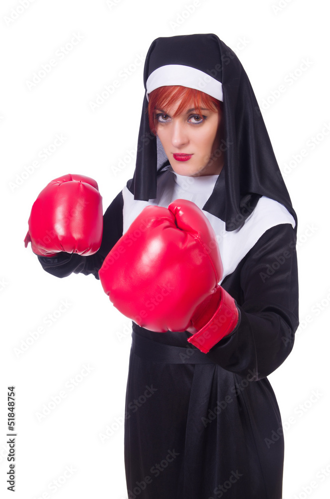 Nun with boxing gloves isolated on white Nun with boxing gloves isolated on white
