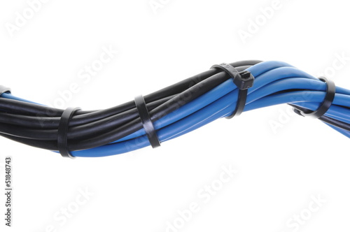Blue and black electrical wires with cable ties