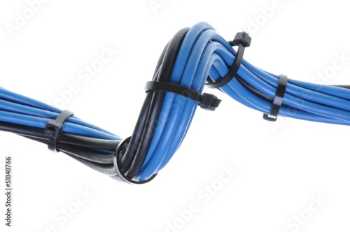 Blue and black electrical wires with cable ties photo