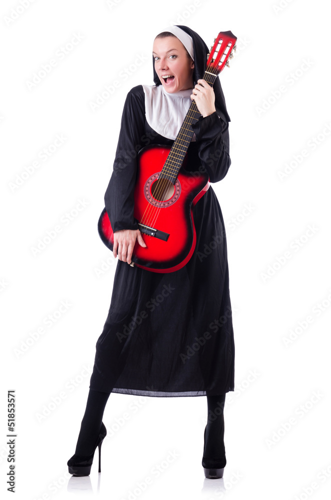 Fototapeta premium Nun playing guitar isolated on white
