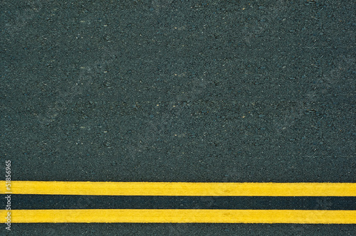 Double Yellow Lines on road. © tiwakorn
