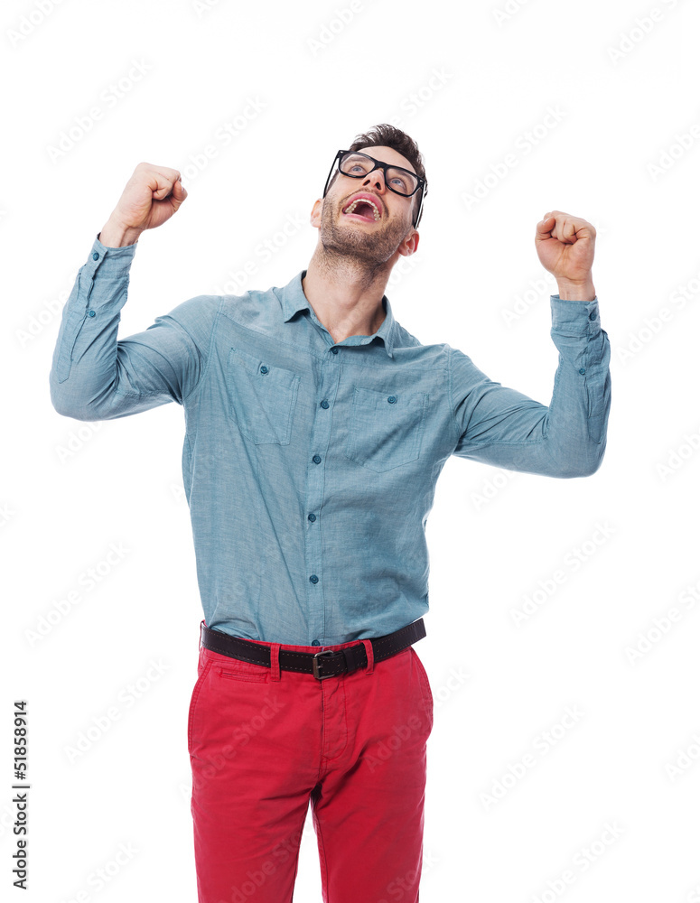 Fototapeta premium Portrait of excited young man