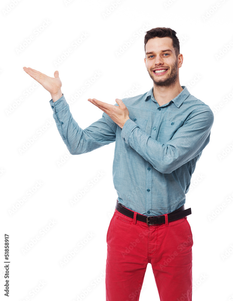Happy male gesturing something on copy space Happy male gesturing something on copy space