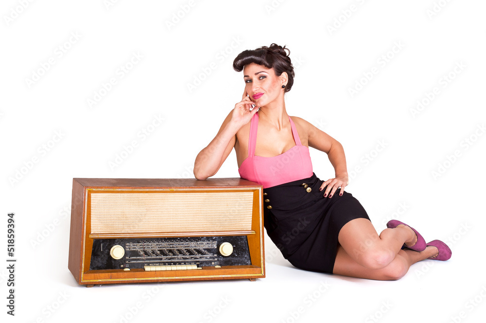 Sexy Frau posiert nebe altem Radio Stock Photo | Adobe Stock