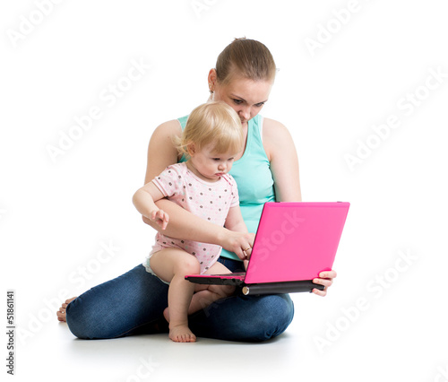 mother and child working at...