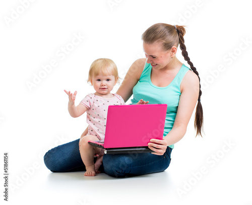 mother and child working at...