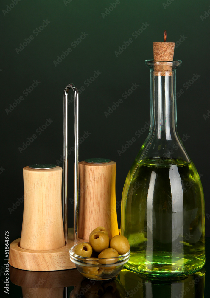Original glass bottle with oil on dark color background