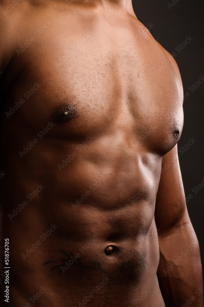 Young African American Man Flexing Abdomen Young African American Man Flexing Abdomen