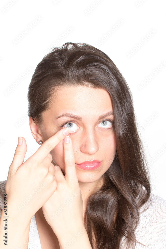 Fototapeta premium Young woman with contact lenses