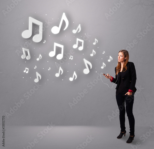 Pretty young woman singing and listening to music with musical n