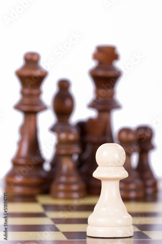 Pawn Against Chess Pieces on Board