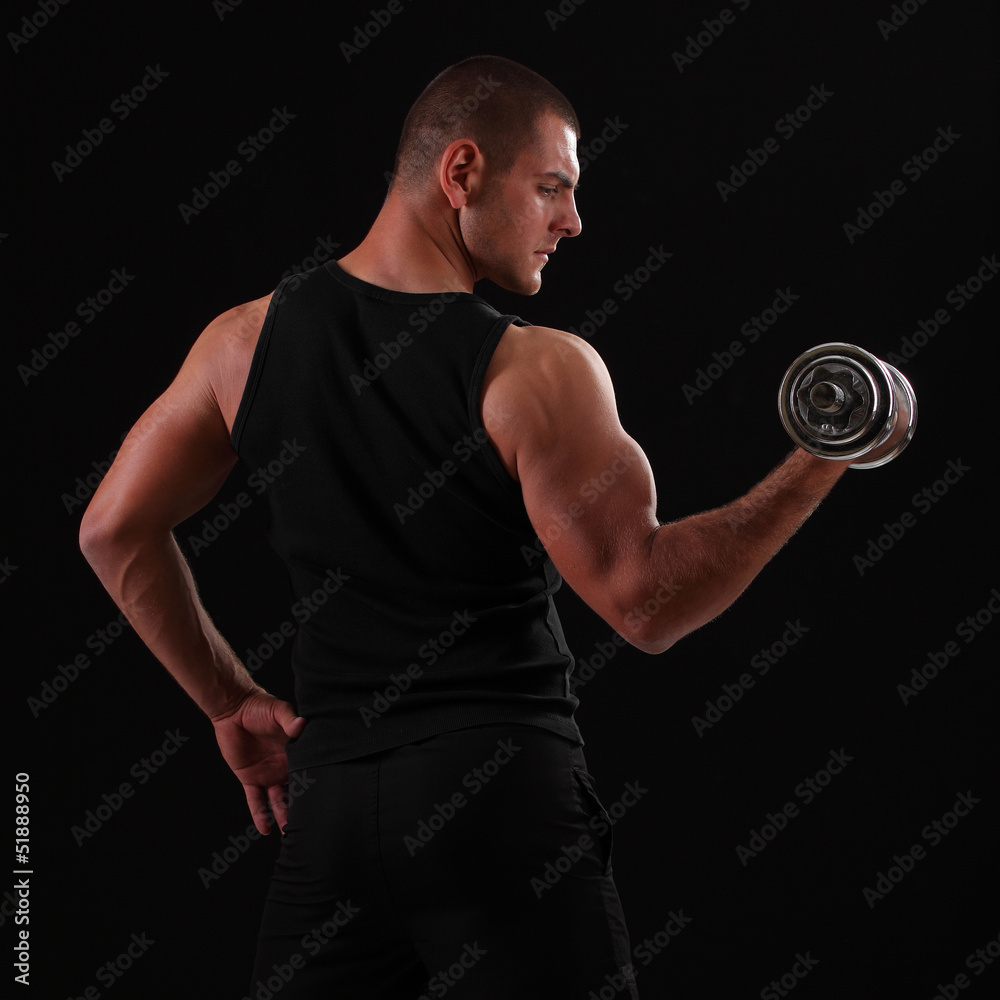 strong man with dumbbells in his hands strong man with dumbbells in his hands