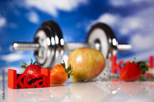 Diet and fitness, dumbell in vitamins 