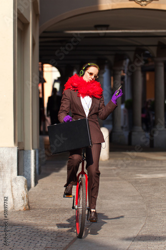 business woman go to work in monocycle