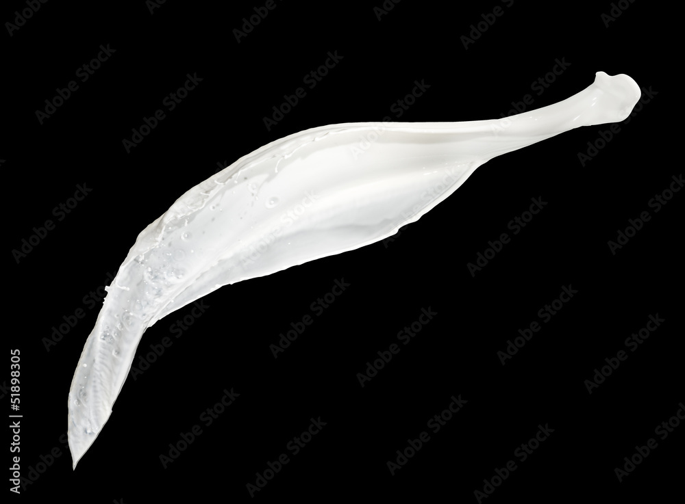 milk flow splash isolated on black background milk flow splash isolated on black background