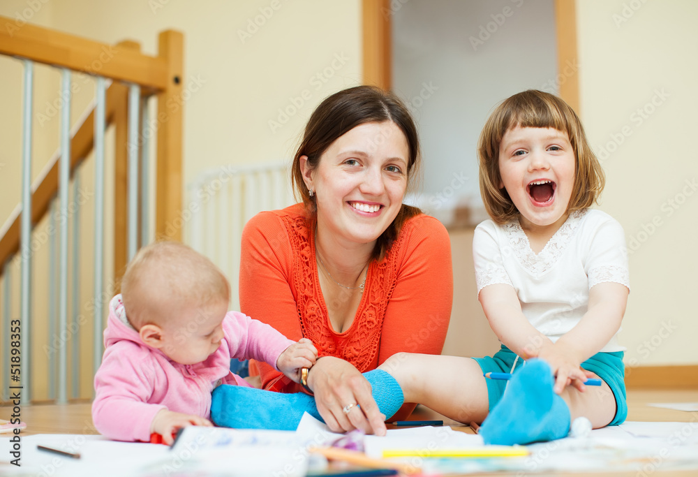 Happy mother with children an home