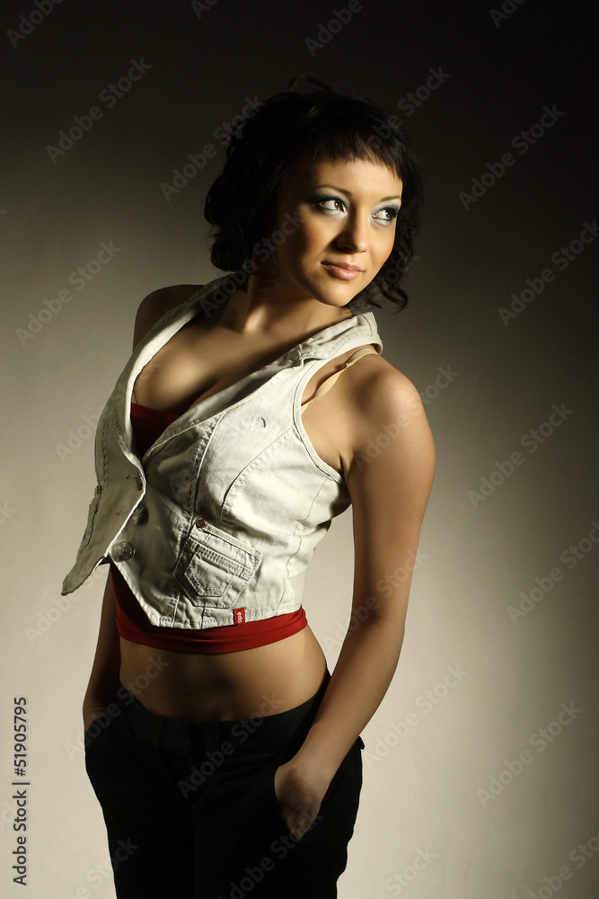 Portrait of attractive beautiful stylish girl in the studio Portrait of attractive beautiful stylish girl in the studio