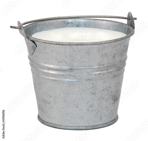 Milk in a miniature metal bucket