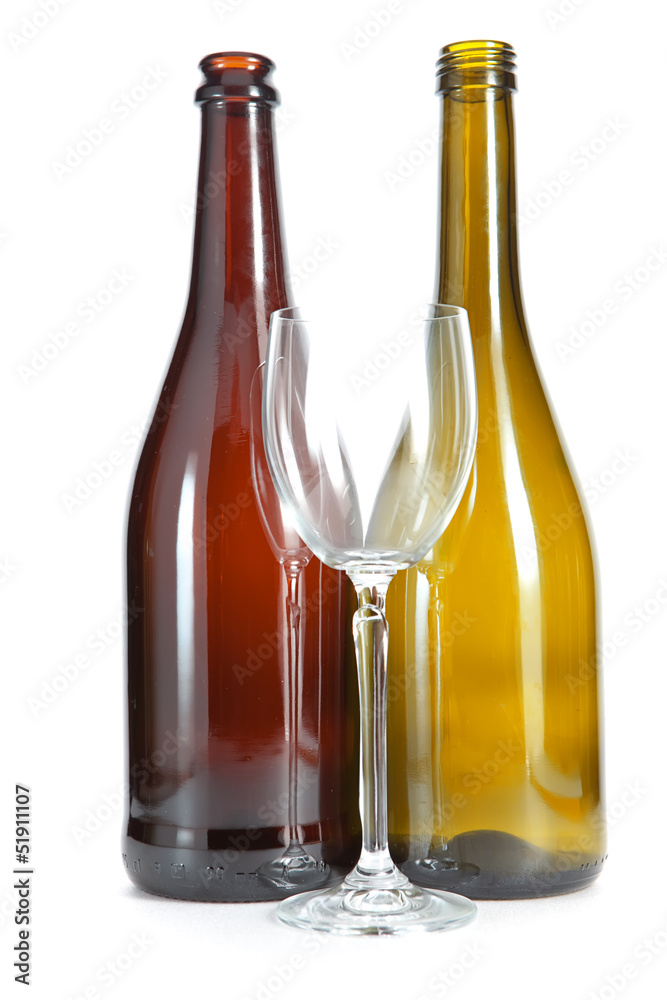 Bright colorful wine bottles and glass Bright colorful wine bottles and glass