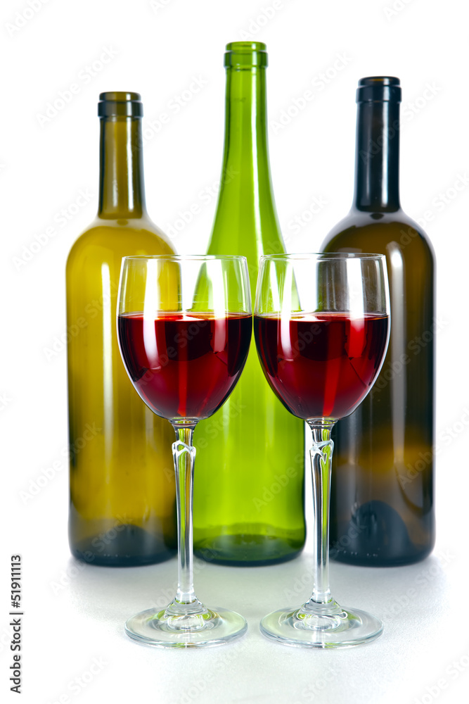 Bright colorful wine bottles and glass Bright colorful wine bottles and glass