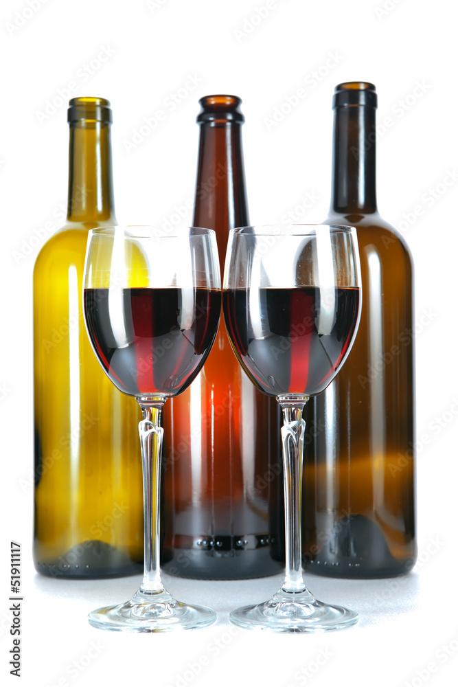 Bright colorful wine bottles and glass Bright colorful wine bottles and glass