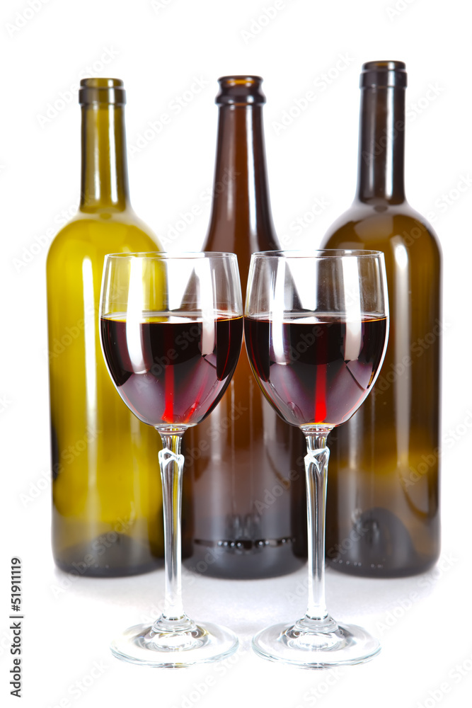 Bright colorful wine bottles and glass Bright colorful wine bottles and glass