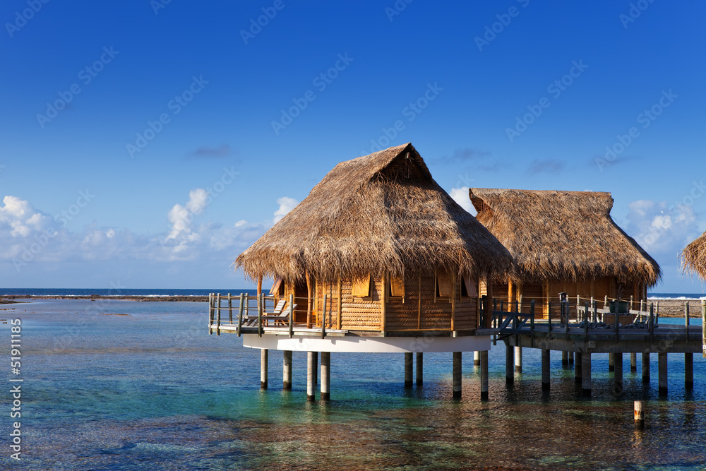 Typical Polynesian landscape -small houses on water...