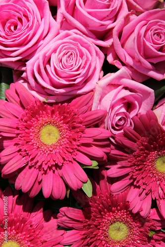 Pink roses and gerberas in a bridal arrangement