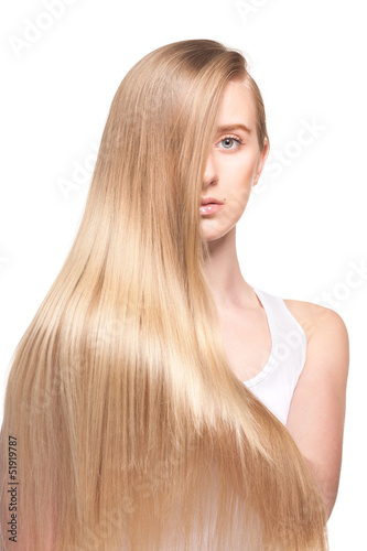 Photo of young beautiful woman with long hair