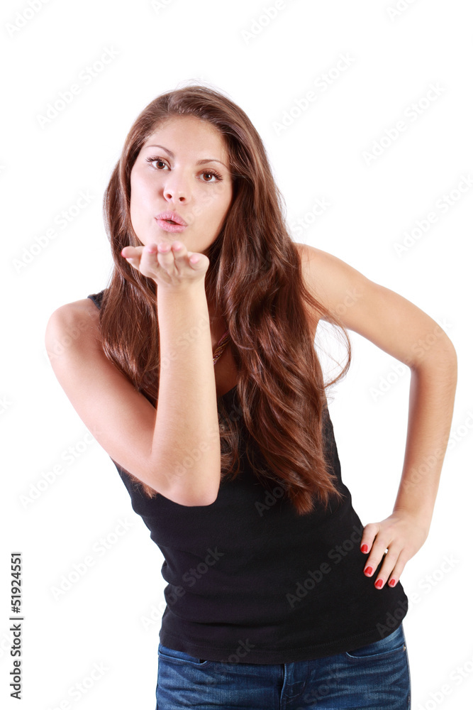Young brunette woman sends air kiss isolated on white Young brunette woman sends air kiss isolated on white