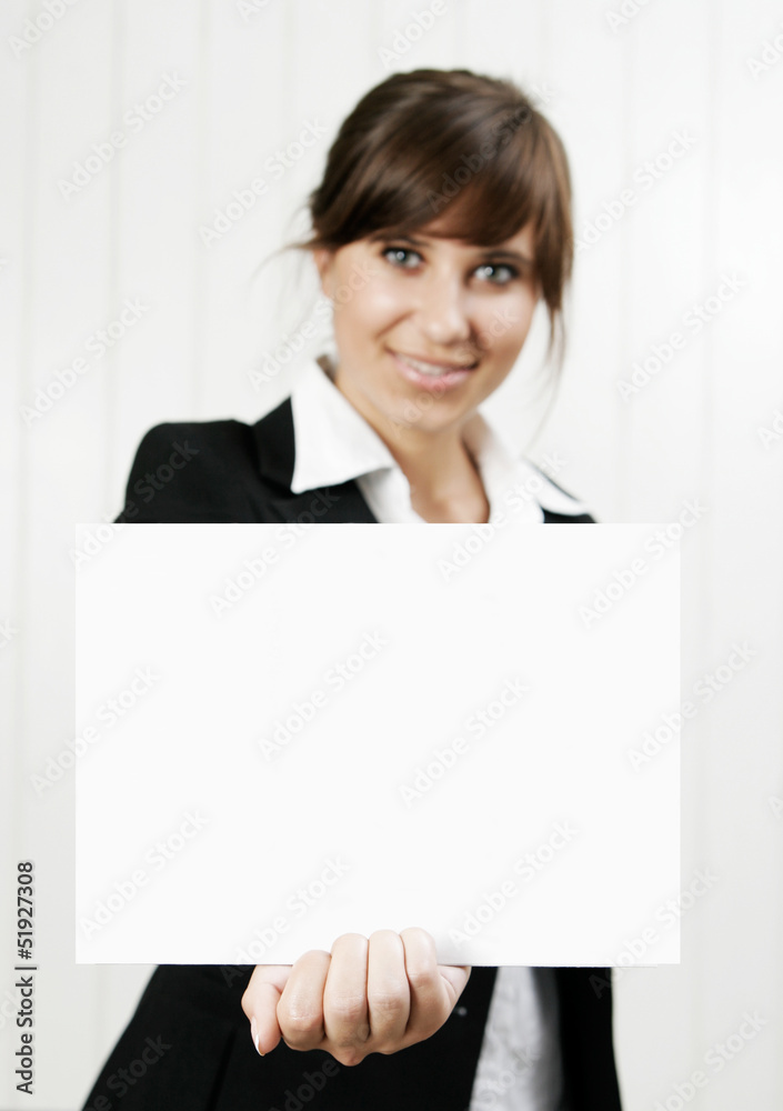 Smiling woman holding an empty card Smiling woman holding an empty card