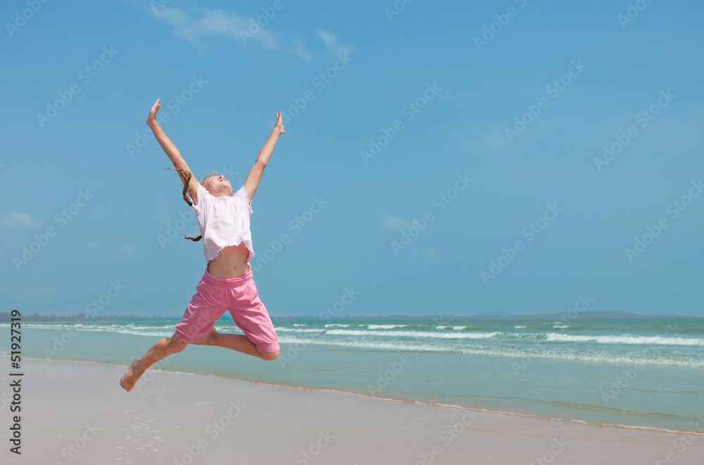 flying jump beach girl on blue sea shore in summer vacation flying jump beach girl on blue sea shore in summer vacation