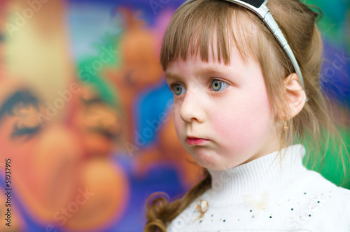 Portrait of a sad little girl
