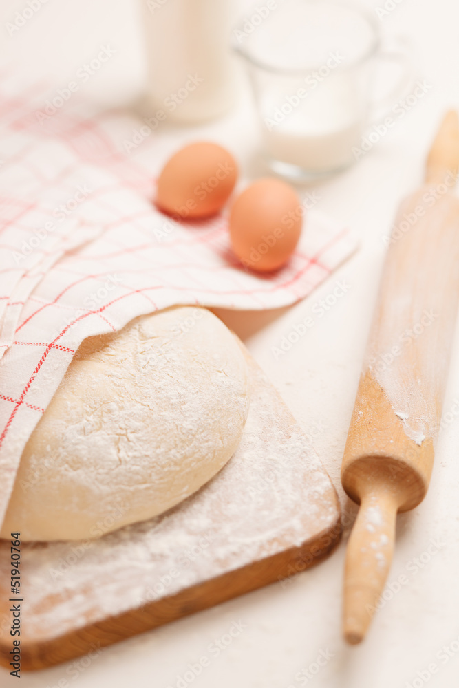 Dough on wooden board Dough on wooden board