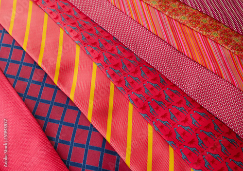Collection of ties in different shades of red