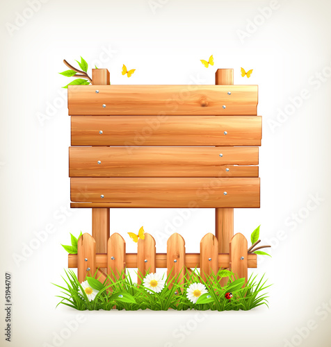 Wooden sign in grass